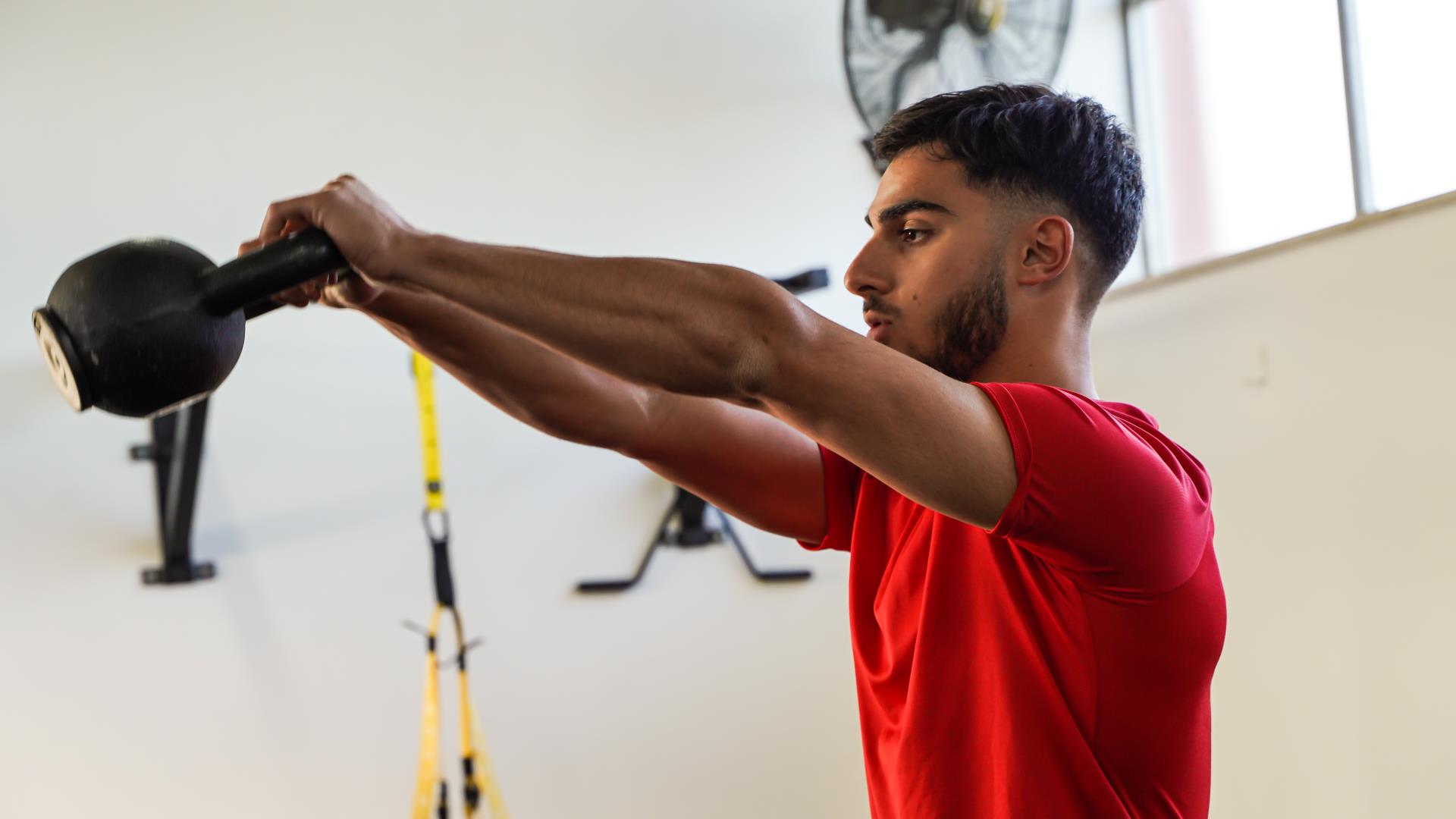 Male doing group fitness class