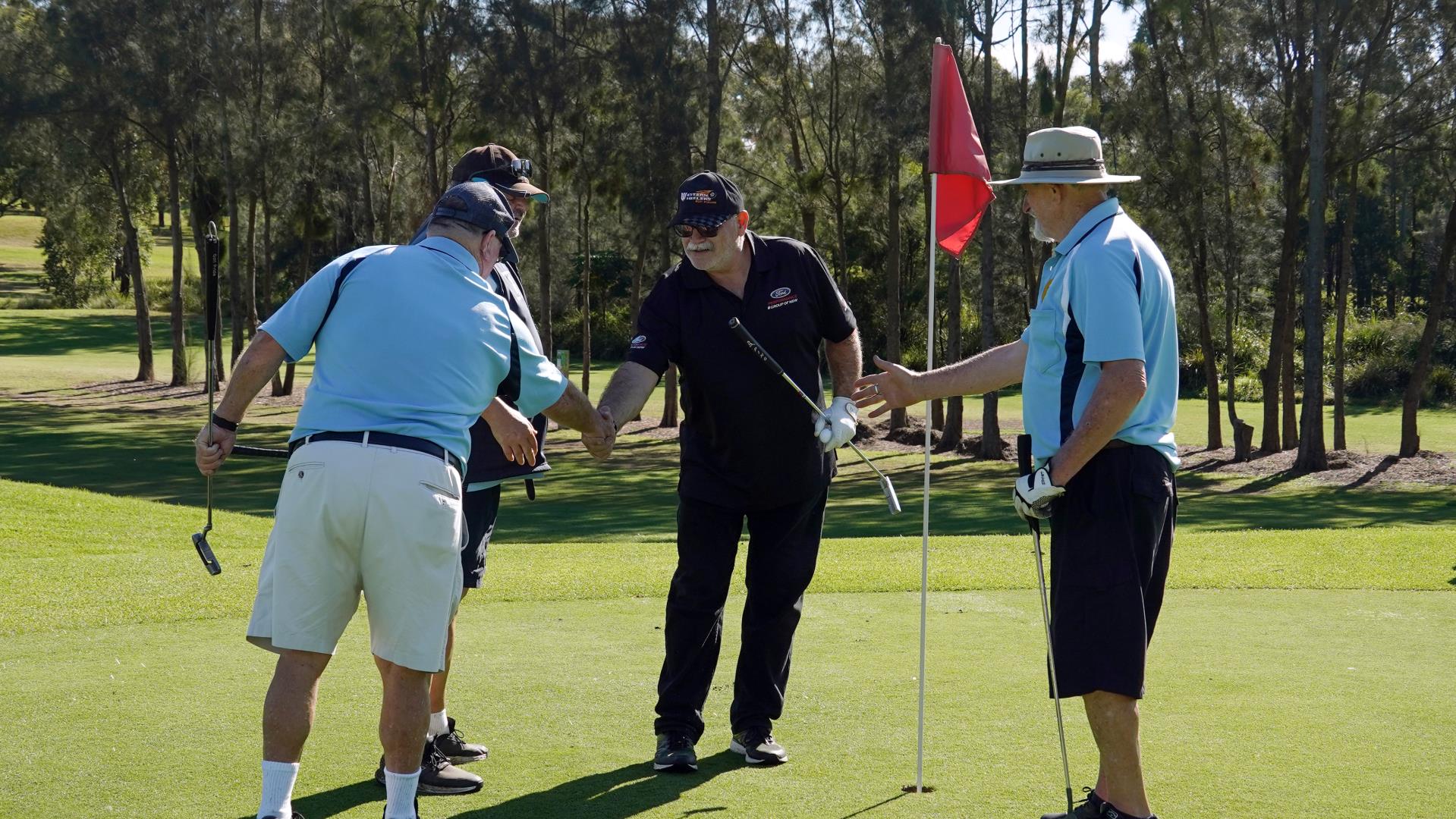 Men playing golf