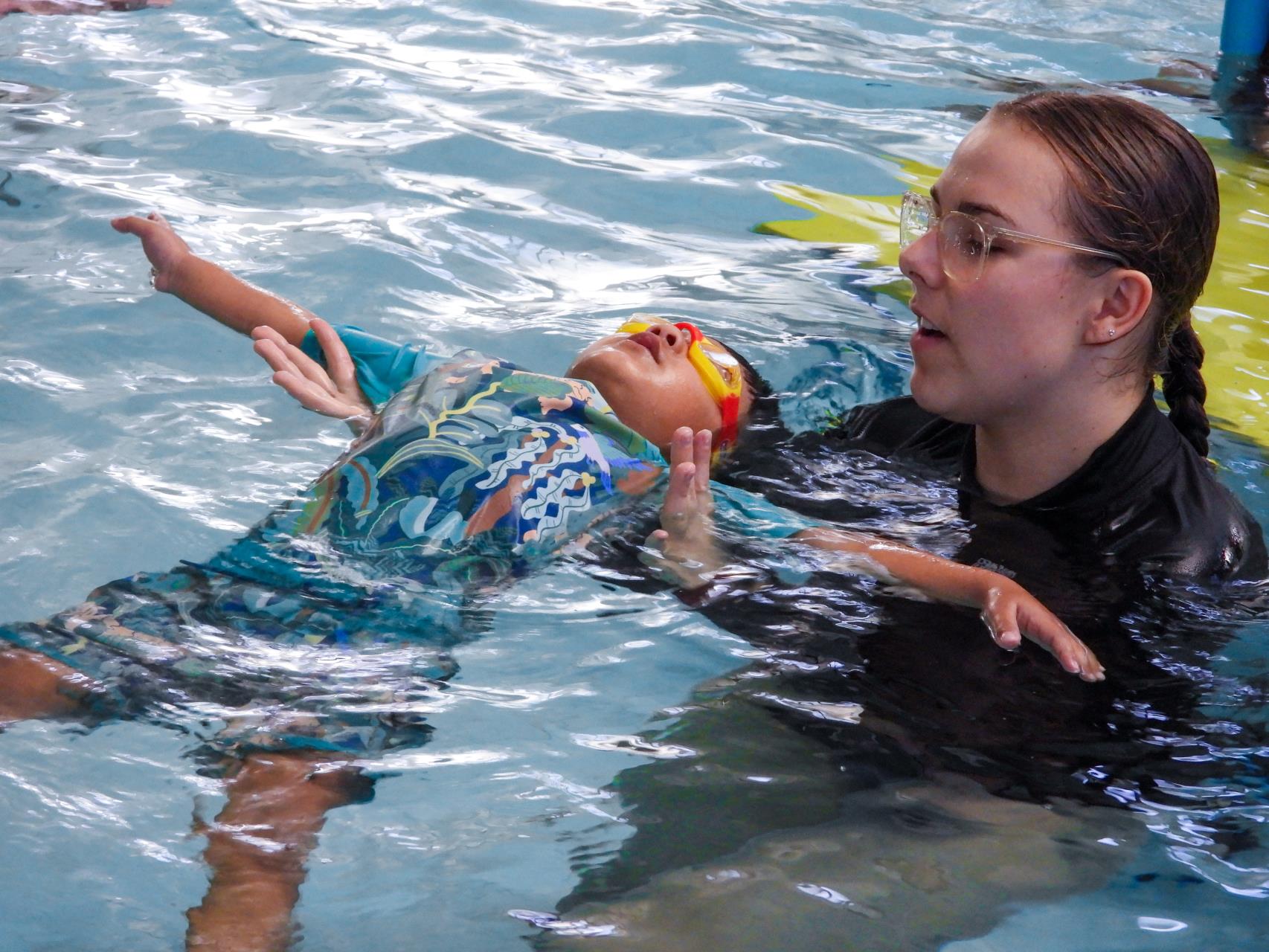 Holiday program student floating